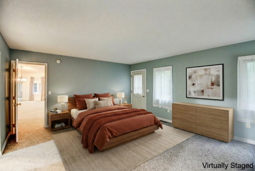 AFTER - Virtually Staged Primary Bedroom Main Bedroom
