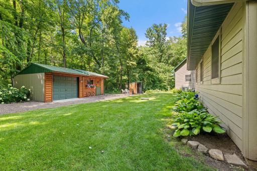 Storage shed with space for your lawn mower and tools, or make it into another hobby space or a place for more fun!