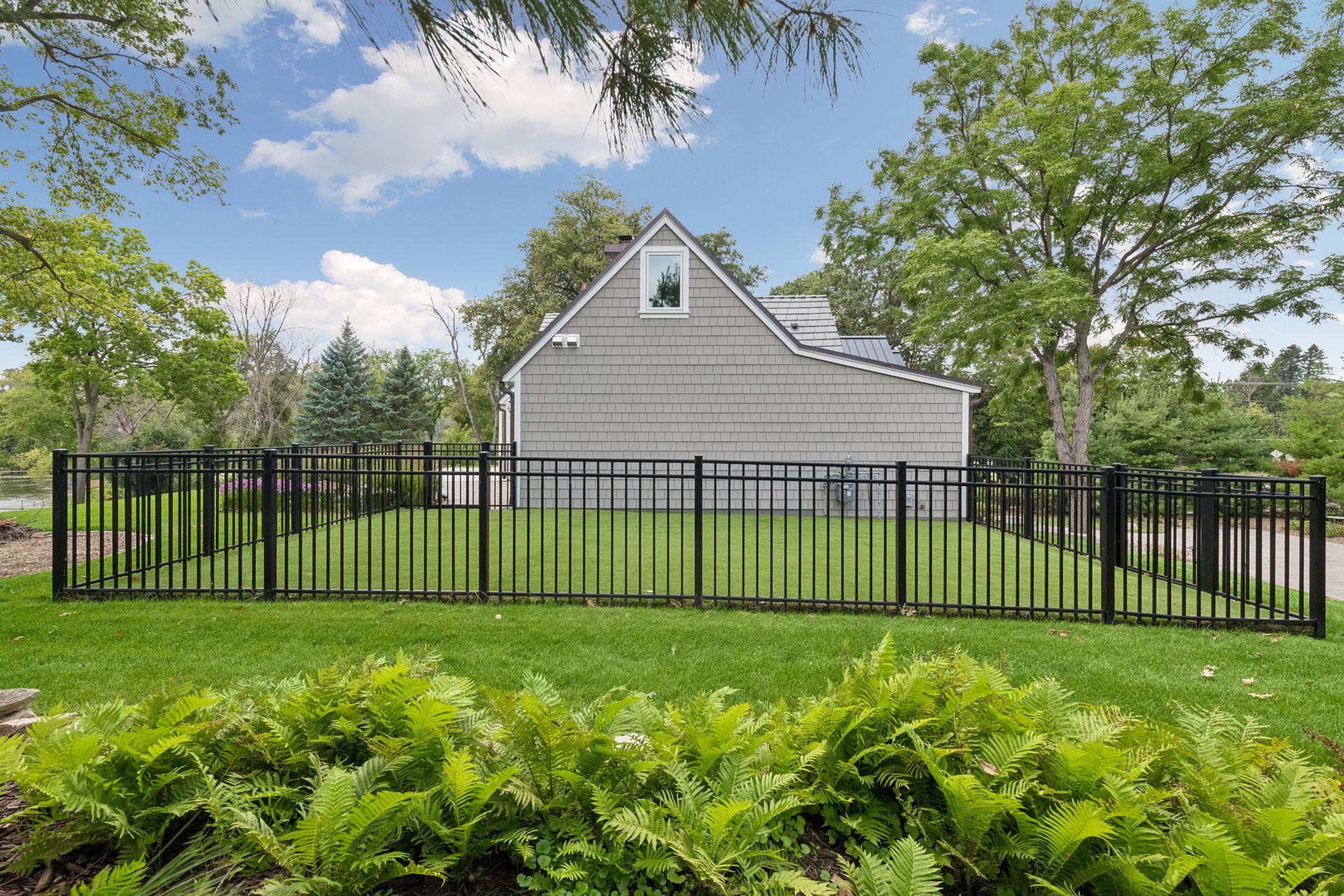 Lovely fenced in space on the east side of the property for pets, gardens, or play area
