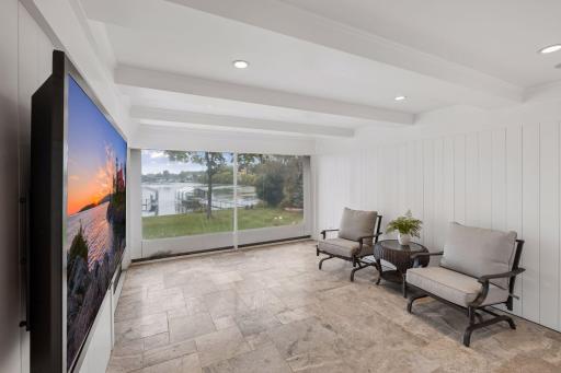 Step out into the screened in porch with Phantom Screens