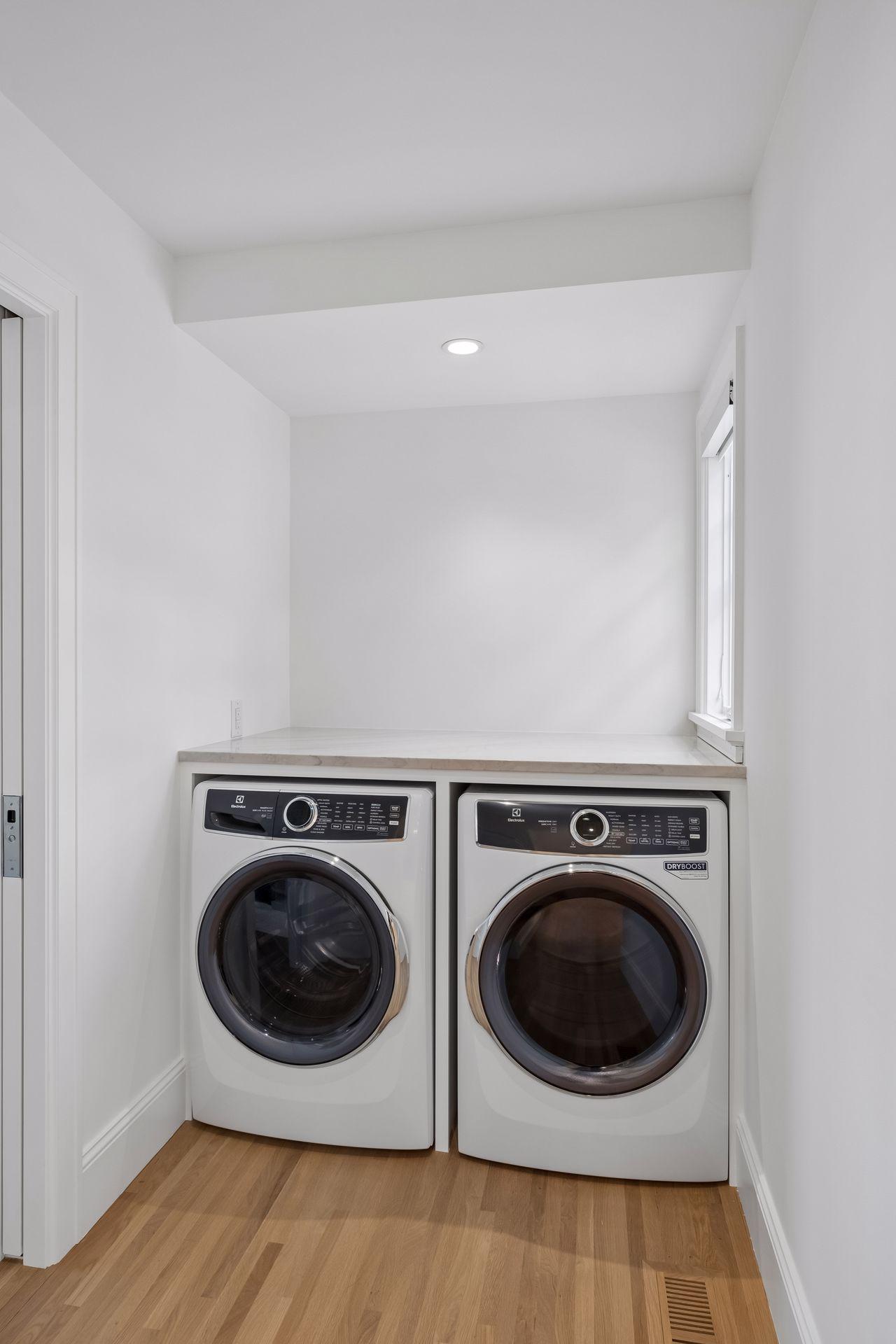 Newly added laundry in the primary walk-in closet