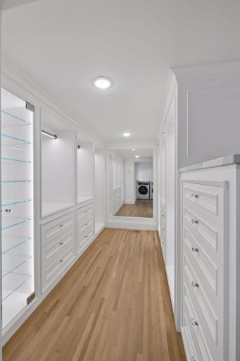 Primary bedroom walk-in closet