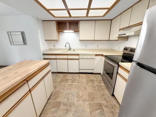Newer refrigerator and range.