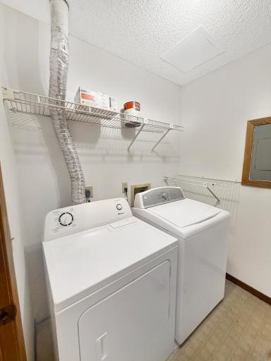 In unit laundry room with additional storage