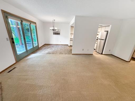 Fresh paint and new carpet create a bright, refreshed feel.