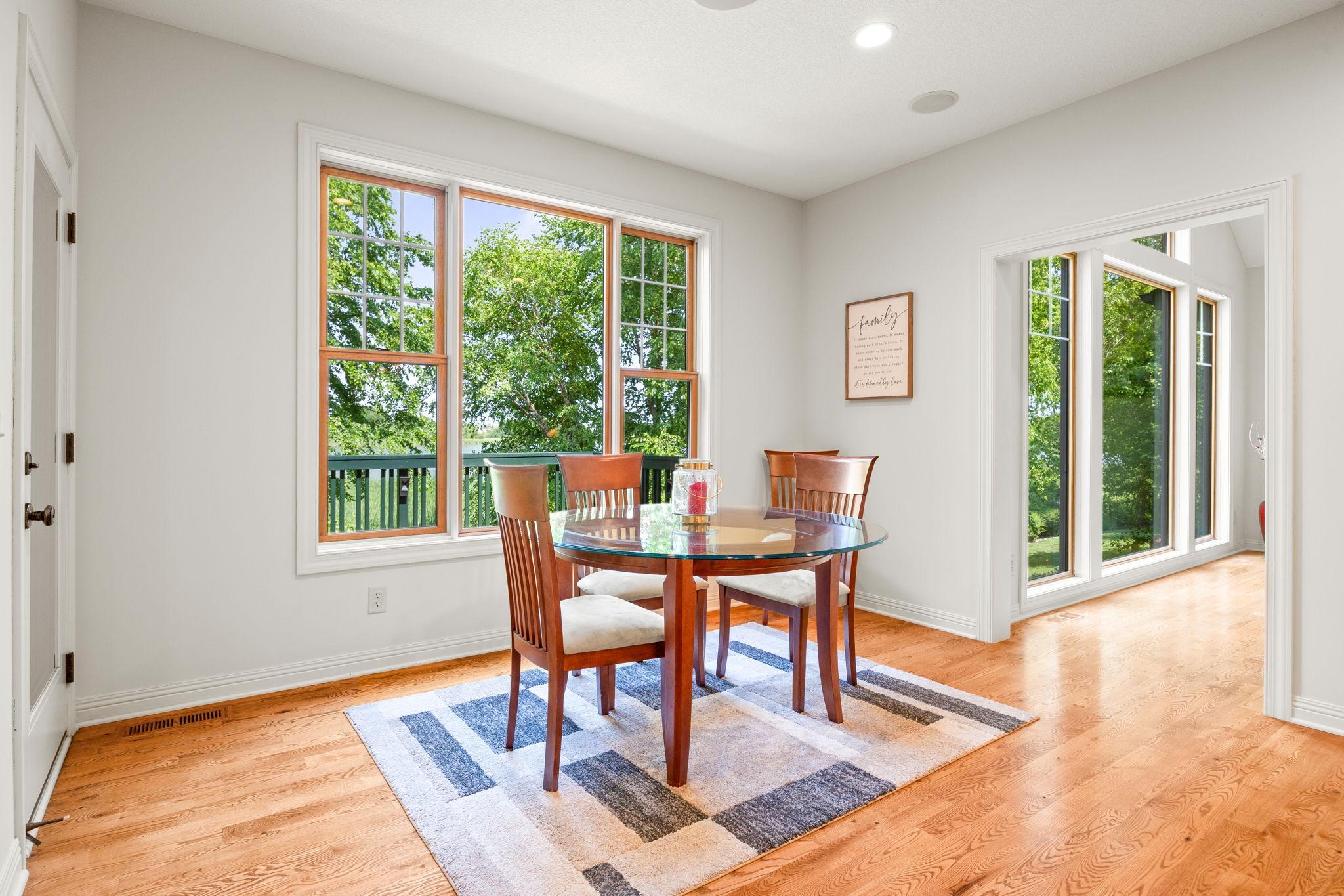 Informal dining with deck and Hunter's Lake view