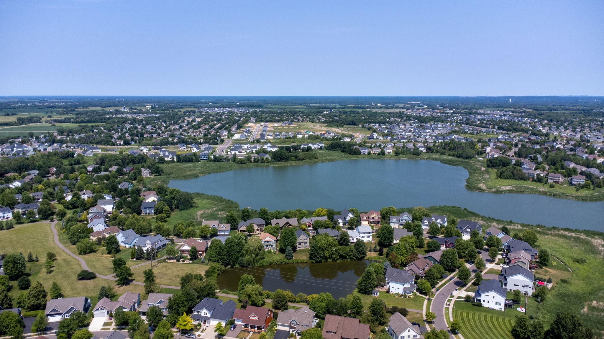 That pond is the neighborhood skating rink in winter. Lights, a modified zamboni enhance our State of Hockey