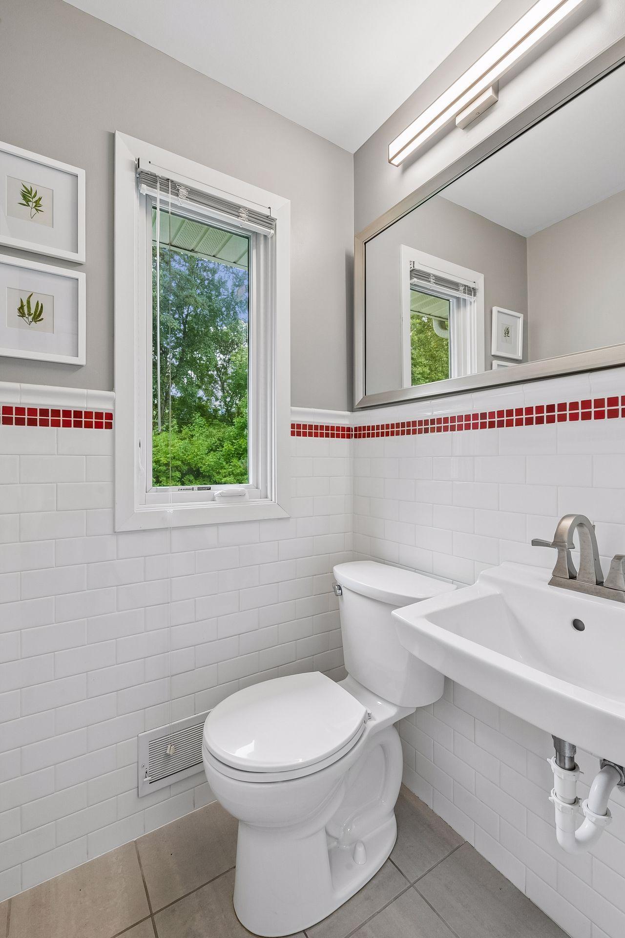Half bath in mudroom/laundry area