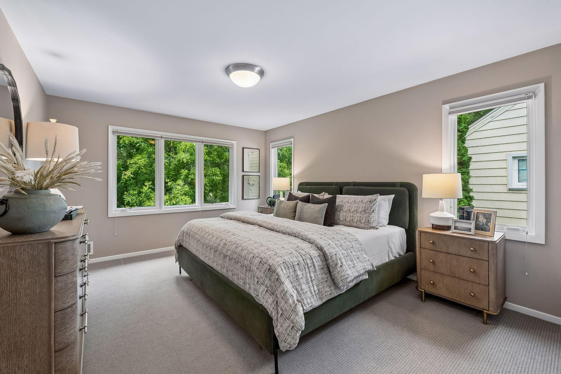 Spacious owner's suite with room for a king-sized bed and dressers.