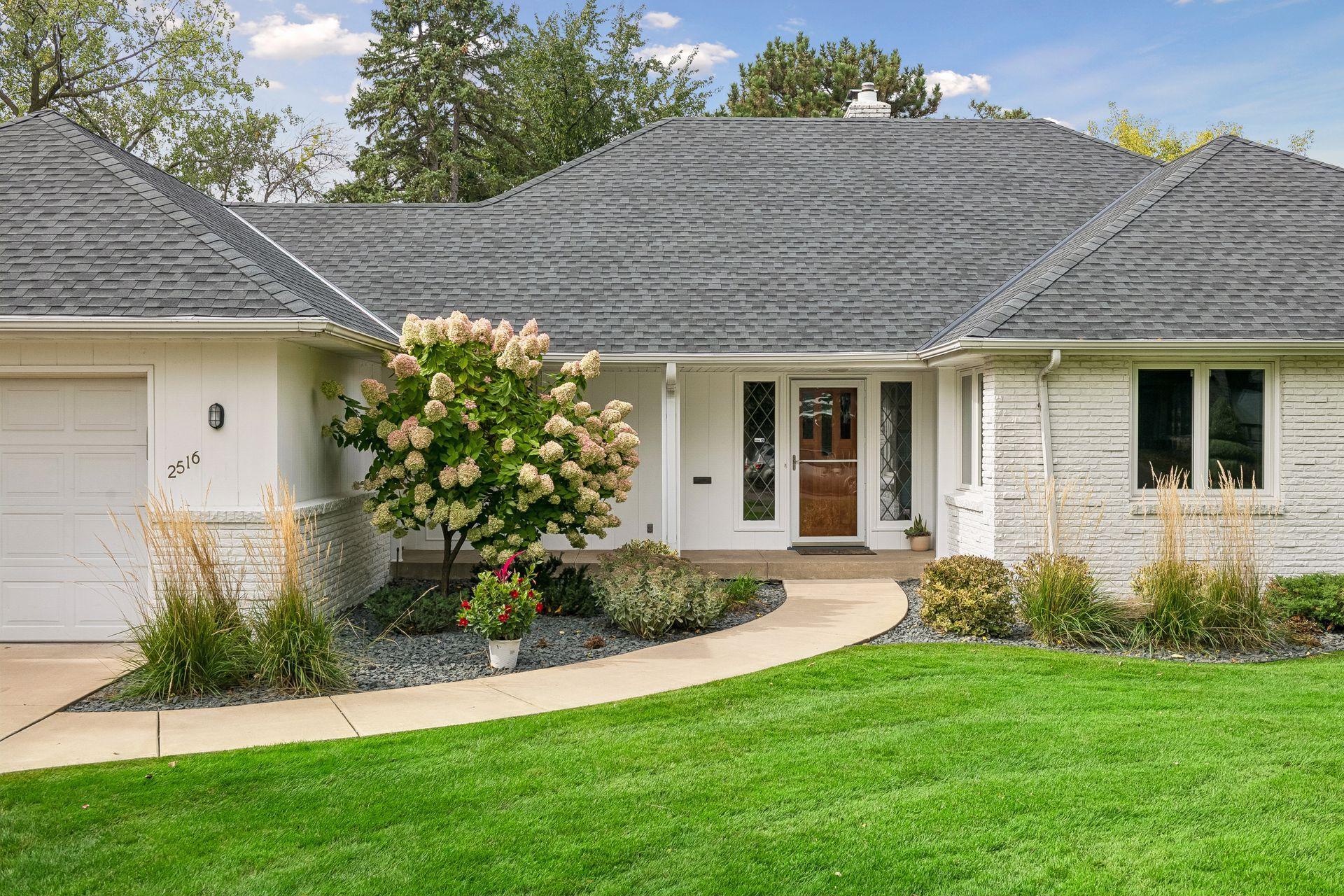 Nestled behind Twin Lakes Parks and just blocks to Cedar Lake