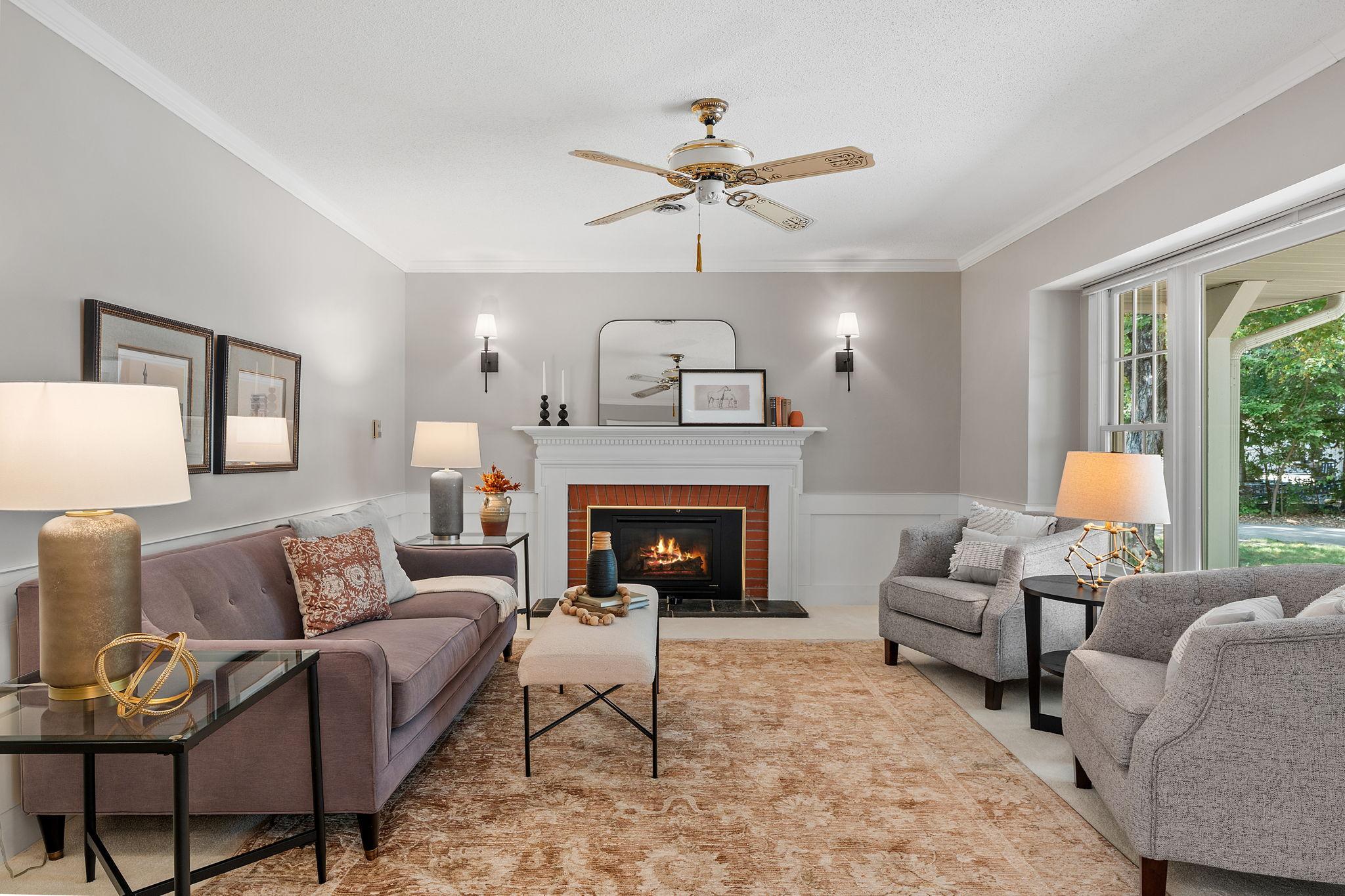 The front living room offers a cozy fireplace to enjoy in the cooler MN months.