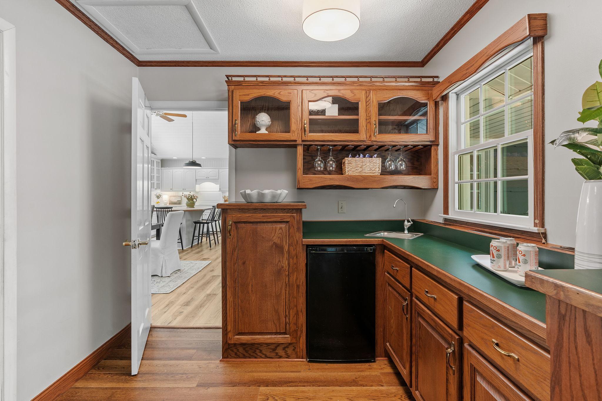 The wet bar will be your go-to spot for movie night or game day snacks.