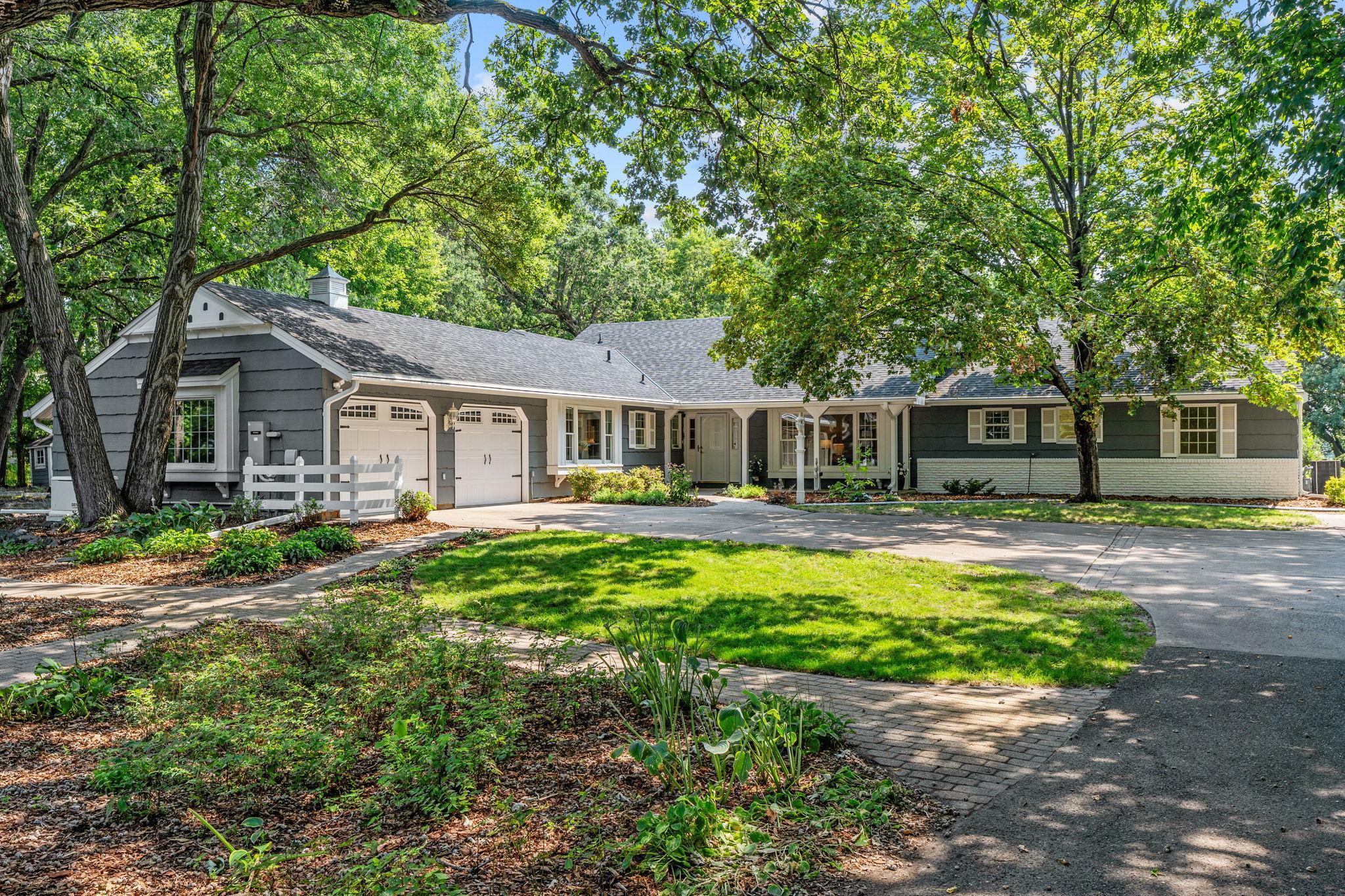 Welcome home to 8211 River Acres Rd, Cottage Grove! This magical home is nestled on 1.8 acres with 239 feet of Riverfront. A rare opportunity in a serene location!