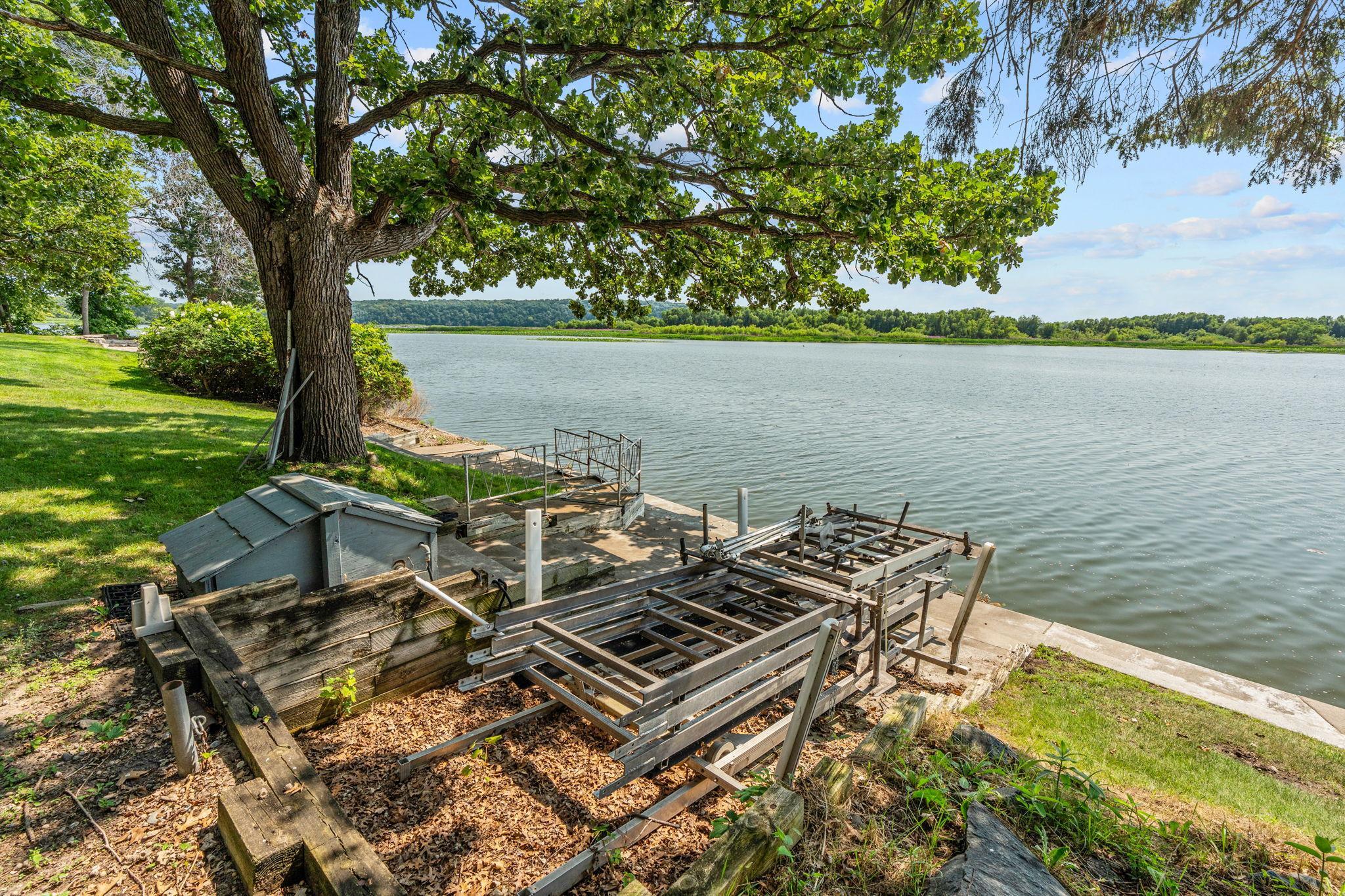 Pump house for lawn sprinkler & boat lift rail system.