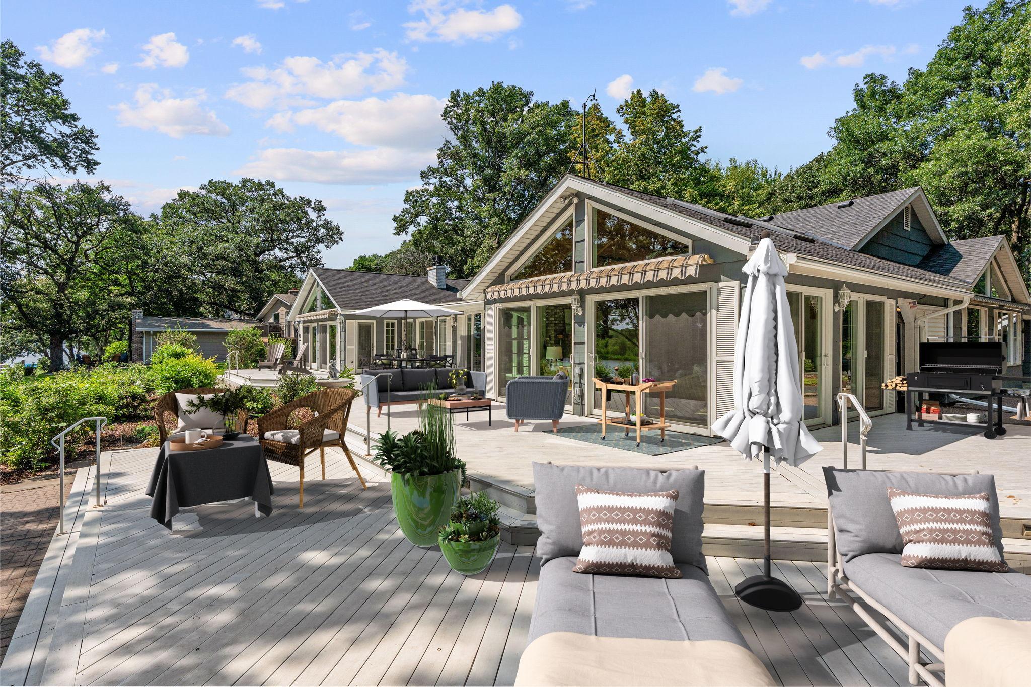 Make your way out to the entertainment sized deck. Deck has been virtually staged