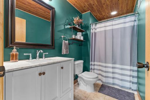 Lower level Bathroom with infloor heating and Custom Ceiling