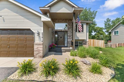 Brick Front Entrance with Nice landscaping