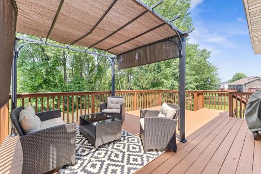 Large Decking Overlooking fenced Yard adjoining Wooded area & Golf Course