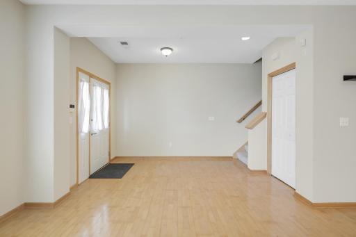The spacious front foyer offers room to decorate with a large area rug, bench/table, and a great piece of art to welcome your guests.
