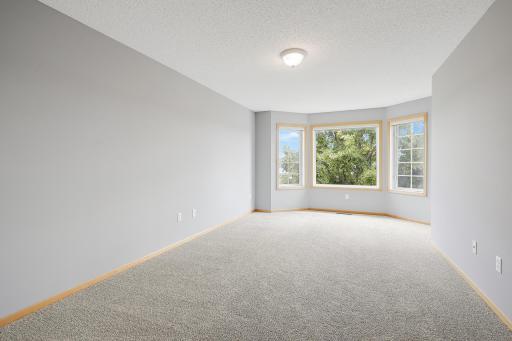 Amazing space for all your bedroom furniture and even could be a cute sitting area in front of the bay window.