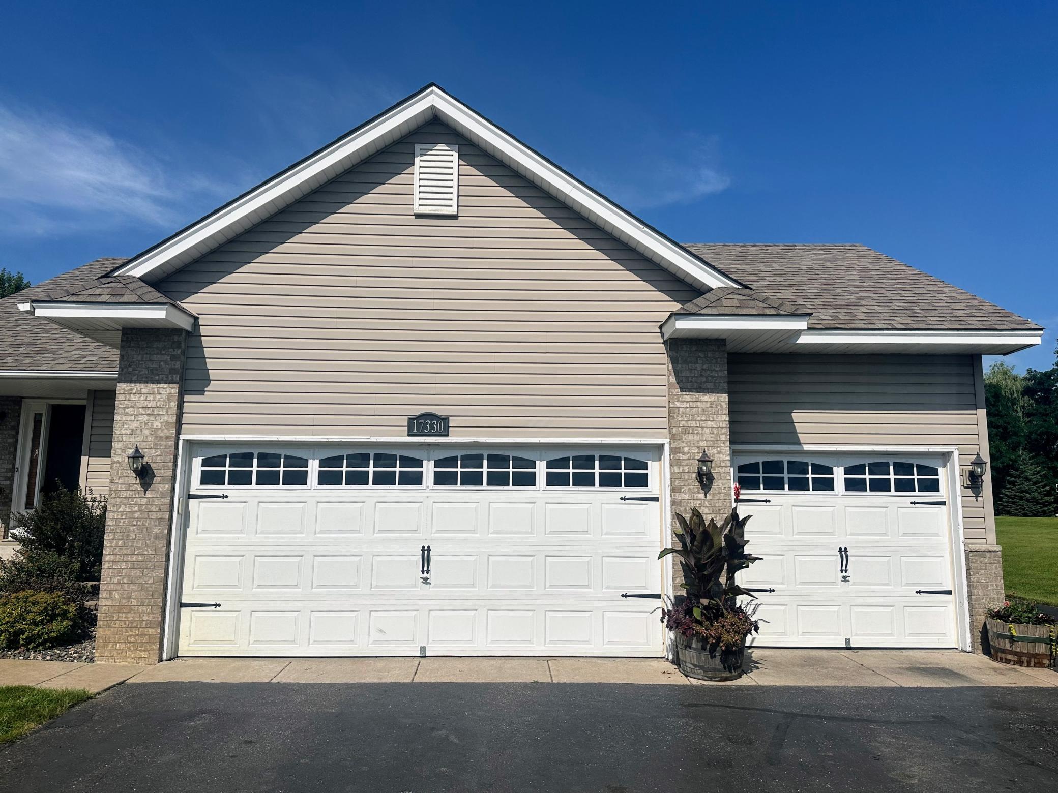 Attached 3-car garage offers plenty of space for vehicles, storage, and more.