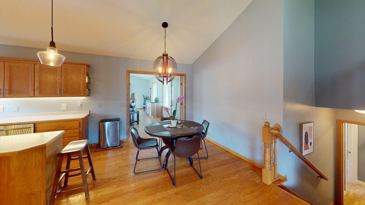 The dining room flows seamlessly into the family room through charming French doors.