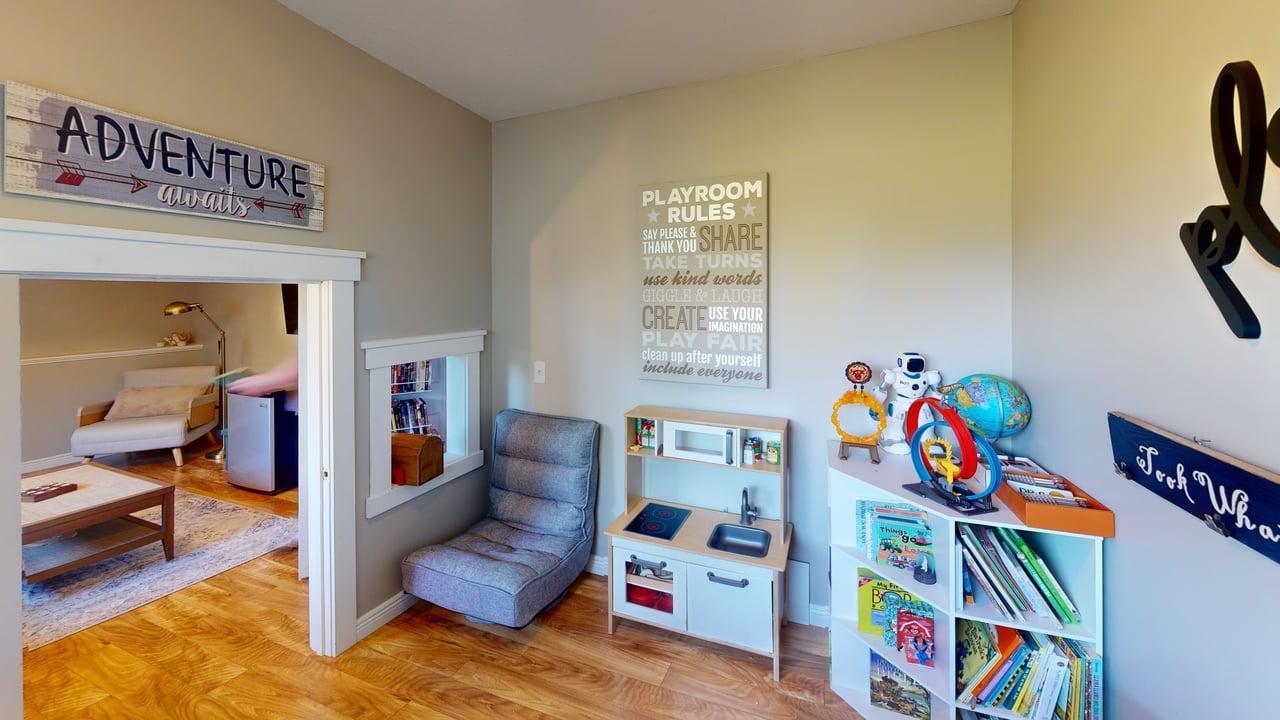 A cozy playroom provides a dedicated space for playtime and family enjoyment.