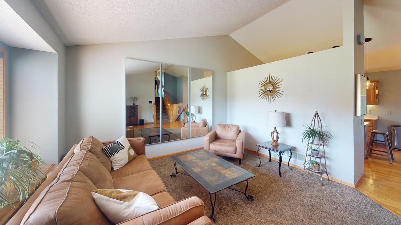 A bright, spacious living room creates a warm and inviting atmosphere.