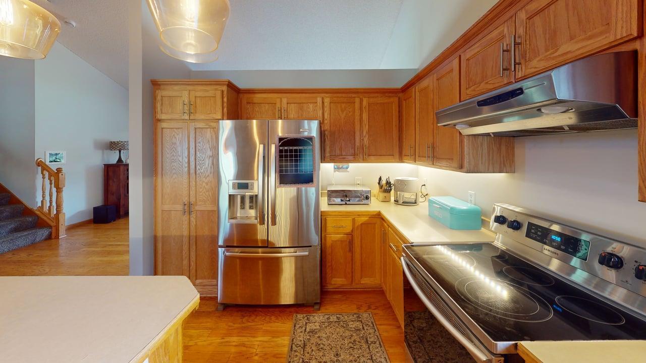 Stainless steel appliances add a sleek, modern touch to the kitchen.