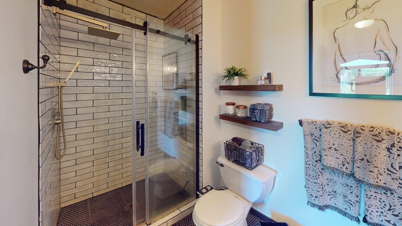 Walk-in shower in primary bathroom.