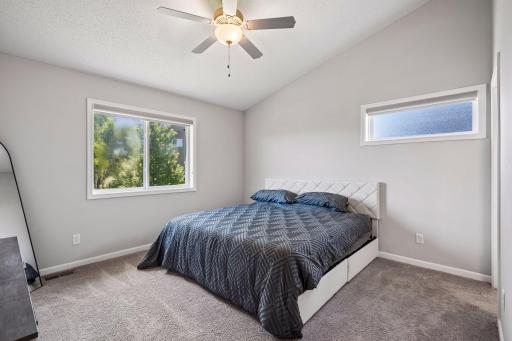 Owner's suite w/ private 3/4 bath and large walk-in closet