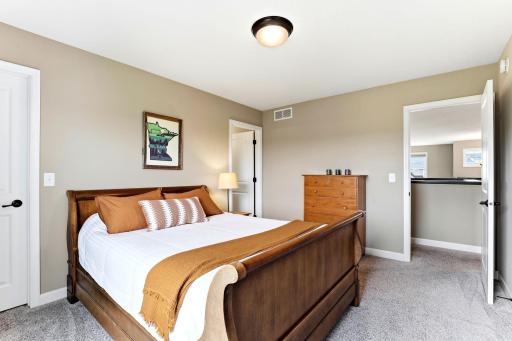 Morning light, a wide closet, and quick access to the hall bath round out this comfortable bedroom.