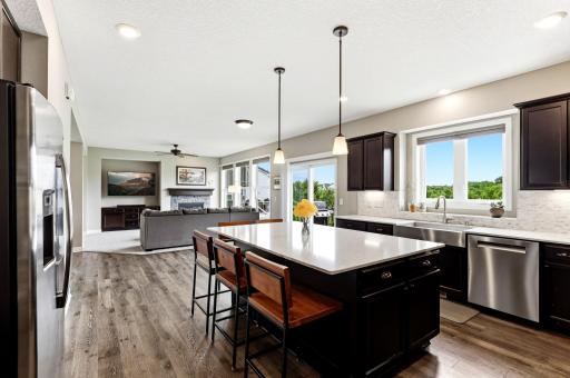 The farmhouse sink enjoy sits own backyard view, and open sightlines keep the cook in every conversation.