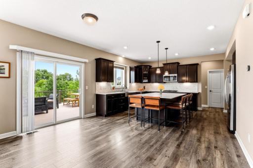 Sliding doors off the dinette open straight to the deck, making summer dinners outside an easy habit.
