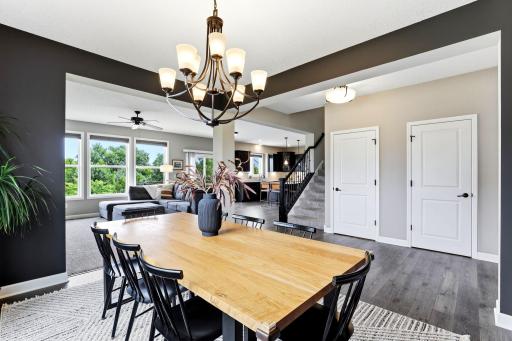 The casual dining space sit sat the heart of the home, steps from the kitchen, great room, and staircase.