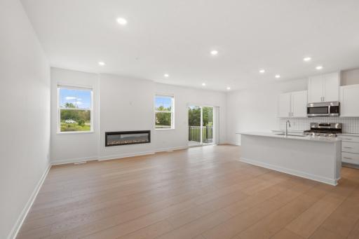 (Photo of an inventory home, actual homes finishes will vary) The Great Room is cozy with an electric fireplace.