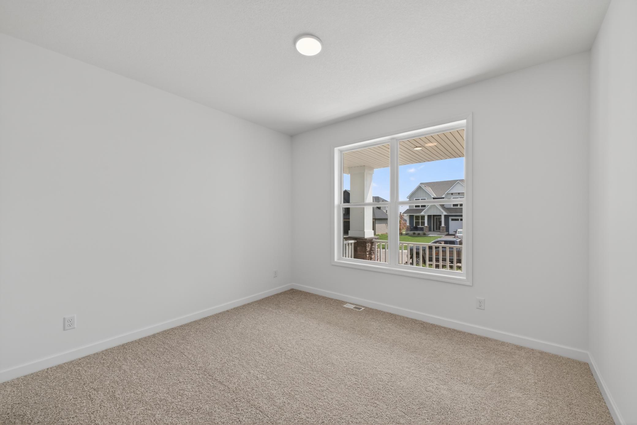 (Photo of a similar home, features will vary) Working from home is a pleasant task when you have a view and light-filled room. Or, turn this into a guest bedroom.
