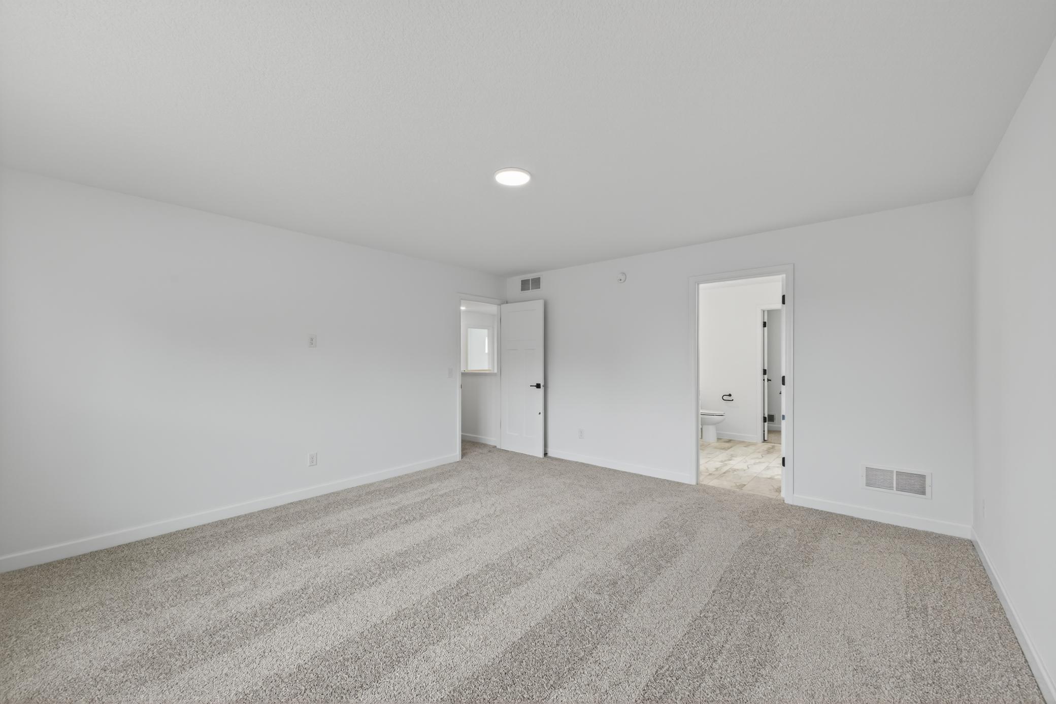 (Photo of a similar home, features will vary) Find your retreat in this stunning owner's suite. Enjoy the exclusivity of a private bath and huge walk-in closet.