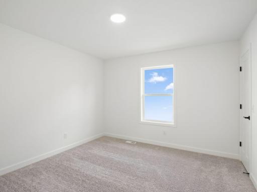 The fourth bedroom is situated on the other end of the home, making it the perfect option for a guest room.