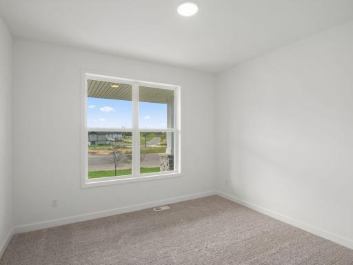 Perfect for an office space or guest suite, this main level bedroom is well-suited for the unique needs of any homeowner.