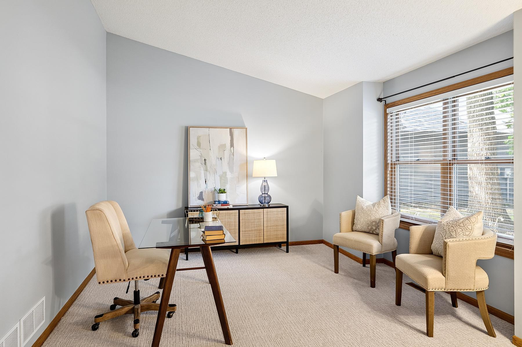 Versatile main level living space could be den, home office, studio, tv room or more!