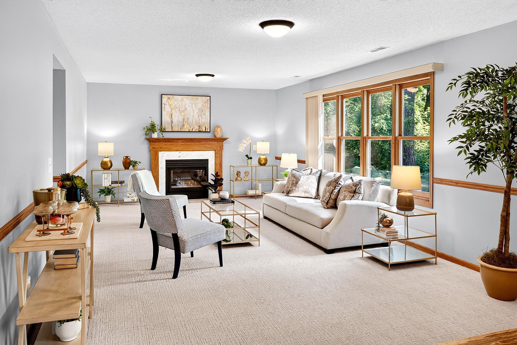 Living room with windows overlooking the lovely backyard.