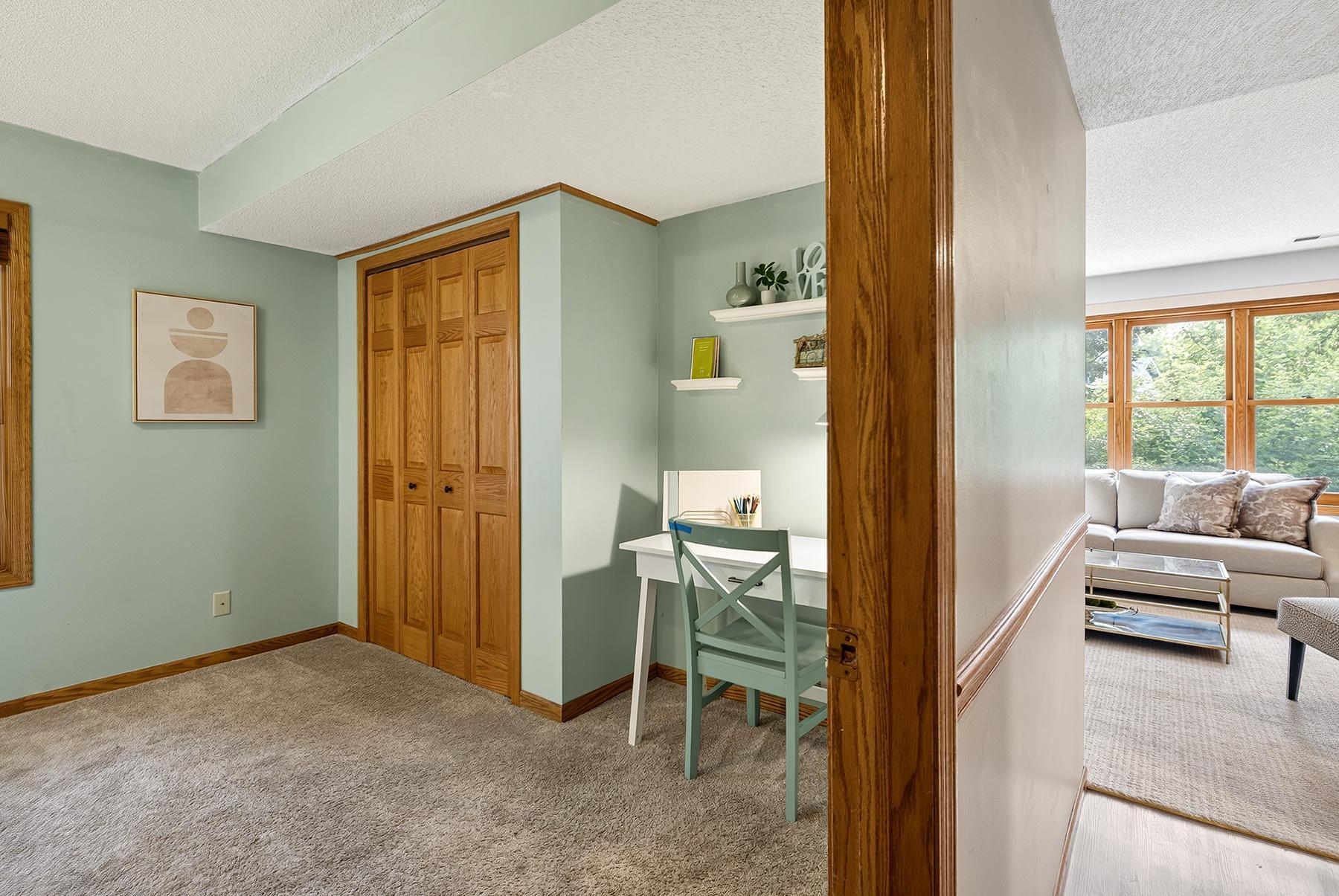 Main floor bedroom. Could also be home office, family room, studio or more.