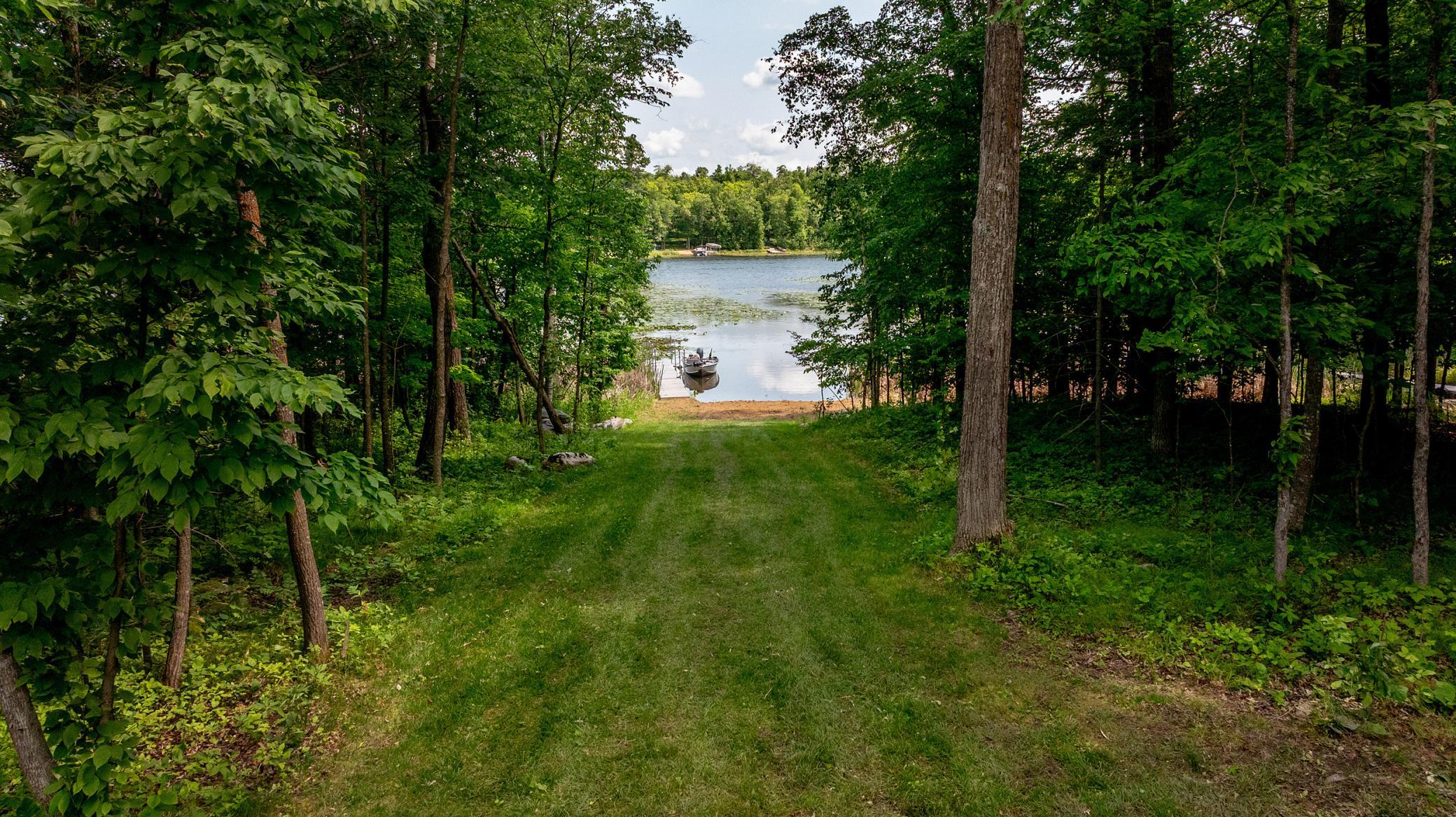 Mature hardwoods throughout the property