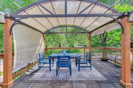 This space gets a decent amount of sun so the seller's addition of the pergola is a perfect use of the space making the rooftop patio ultra usable.