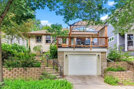 Welcome 3547 Dupont Ave N! An absolute oasis in the city. Immaculate outdoor spaces and the only attached garage in the zipcode!