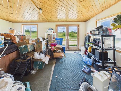 Lower level 2 seasons porch with walk-out patio door