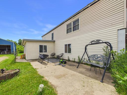 Concrete patio area on the backside of the home