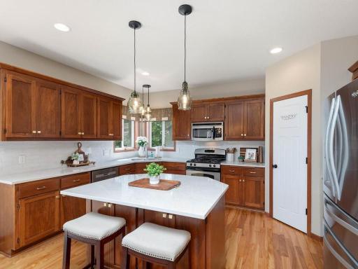 Updated granite countertops and backsplash
