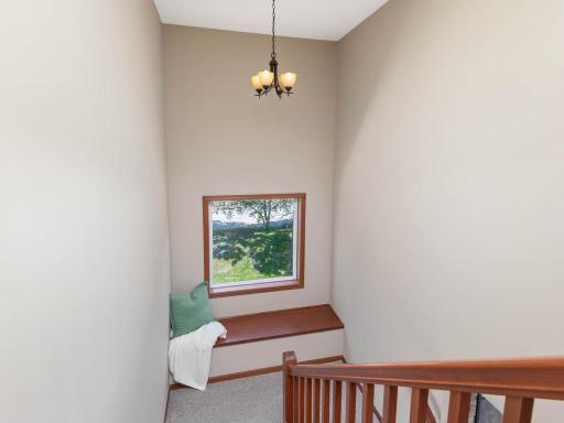 Window seat and window let in more natural light